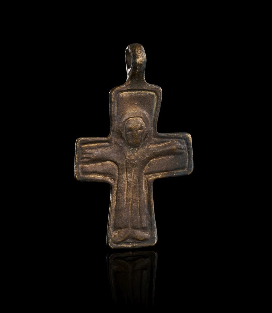 A BYZANTINE BRONZE CROSS DEPICTING THE CRUCIFIXION, CIRCA 8TH CENTURY A.D. (1 of 2)