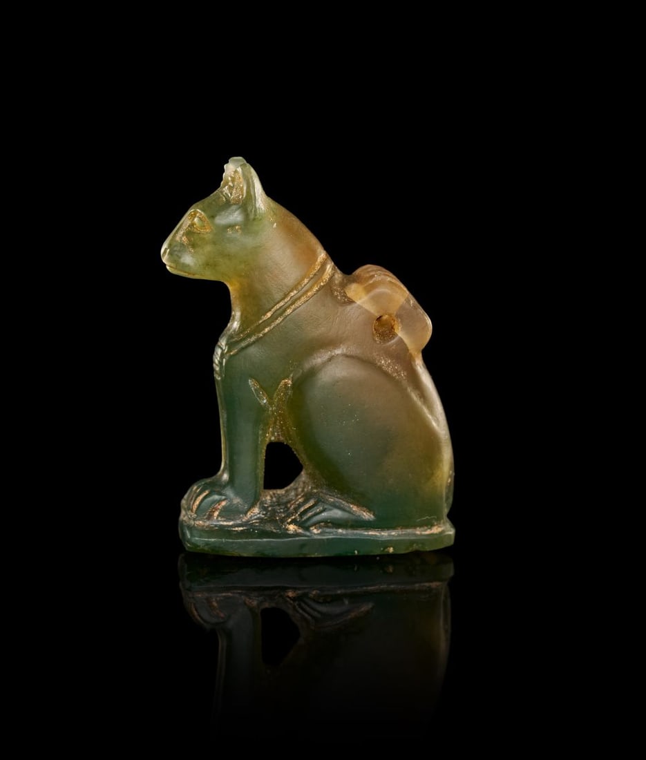 AN EGYPTIAN GREEN CHALCEDONY CAT AMULET LATE PERIOD TO PTOLEMAIC PERIOD, 664-30 B.C. (1 of 3)