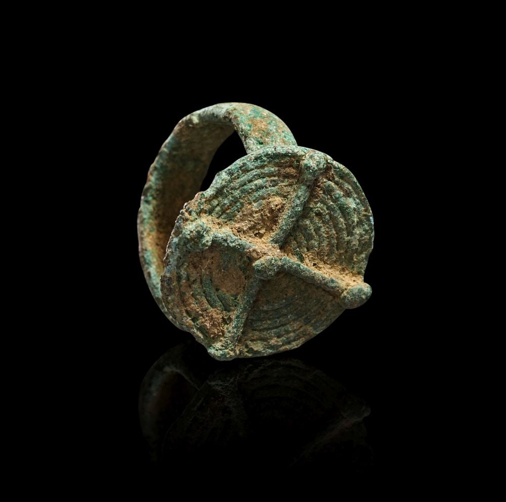 A BRONZE AGE BRONZE RING CIRCA 1200-600 B.C. (1 of 3)