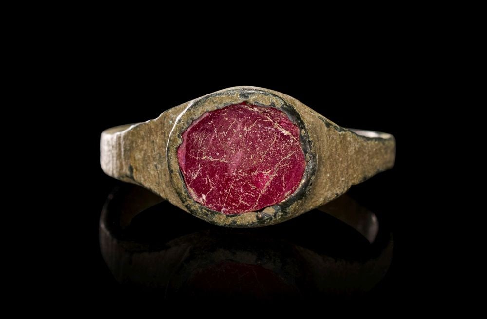 A BRONZE AGE BRONZE & GEM RING CIRCA 1200-600 B.C. (1 of 3)