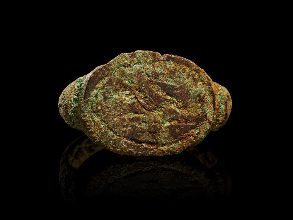 A BRONZE AGE BRONZE RING CIRCA 1200-600 B.C. (1 of 2)