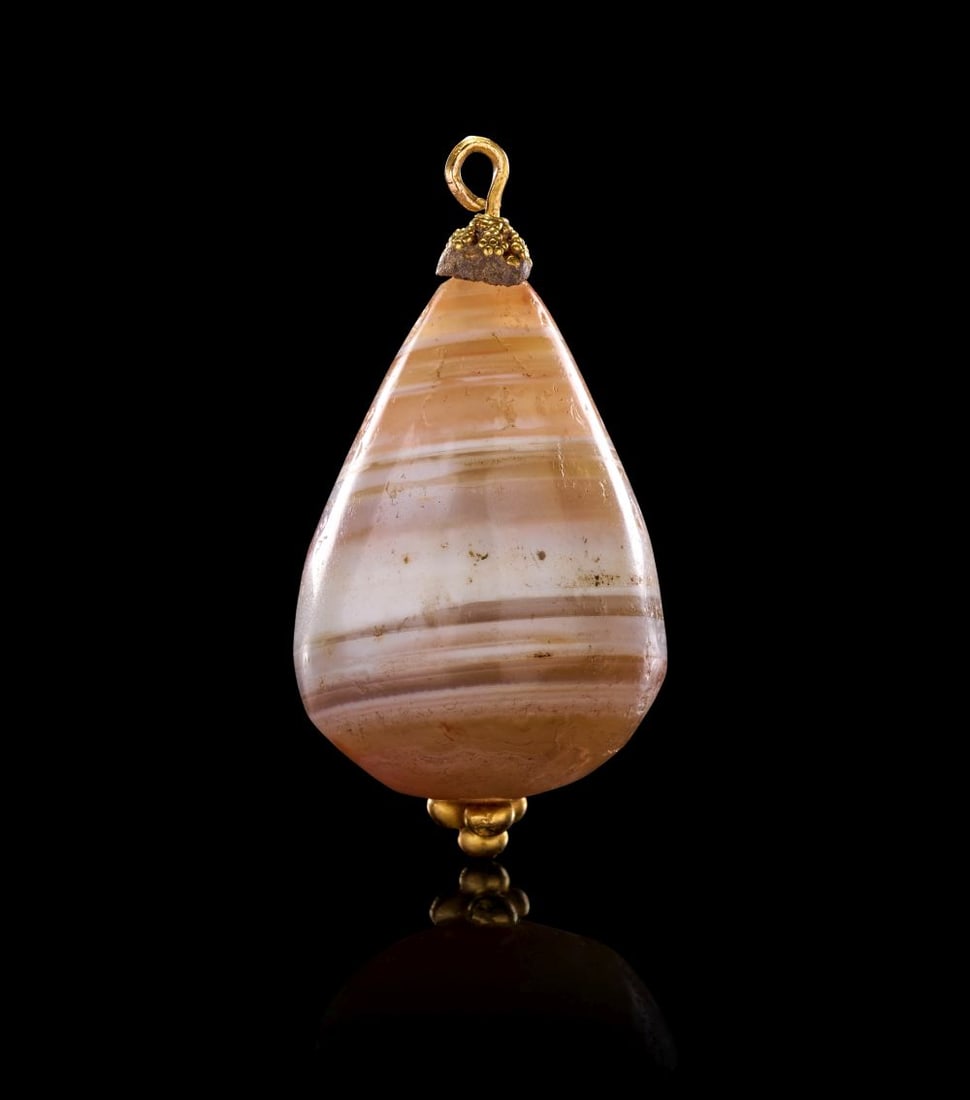AN ELAMITE BANDED AGATE AMULET IRAN, CIRCA 1200 B.C. (1 of 3)