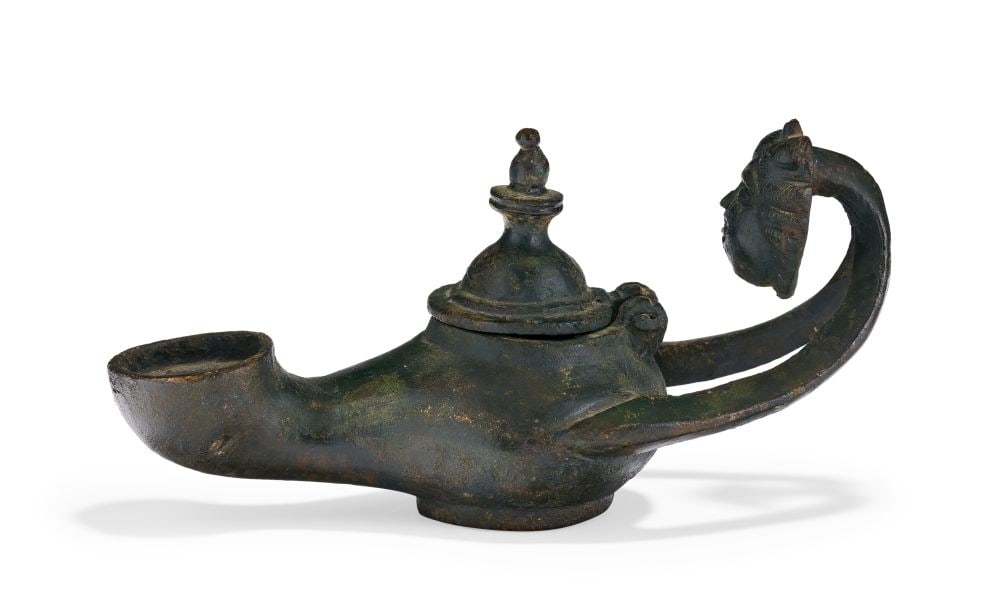 A ROMAN BRONZE OIL LAMP CIRCA 1ST CENTURY A.D. (1 of 5)