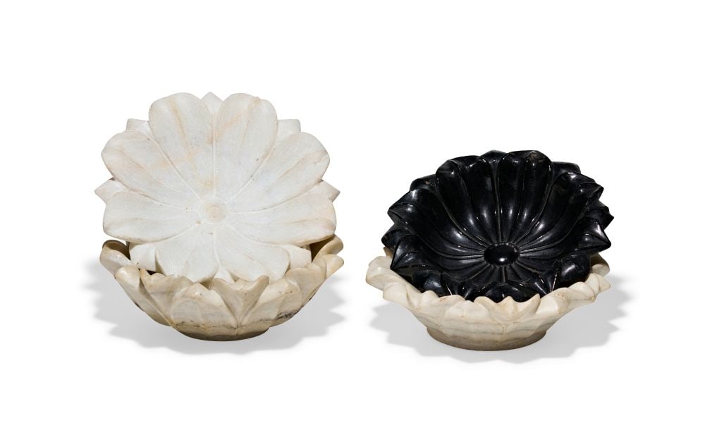 FOUR MUGHAL HARDSTONE "LOTUS" FLOWER SHAPED DISHES, 19TH/20TH CENTURY, INDIA: FOUR MUGHAL HARDSTONE “LOTUS” FLOWER-SHAPED DISHES, CIRCA 19TH–20TH CENTURY A.D. Carved from pale, translucent hardstone and worked into deeply lobed, lotus-form profiles, this ele