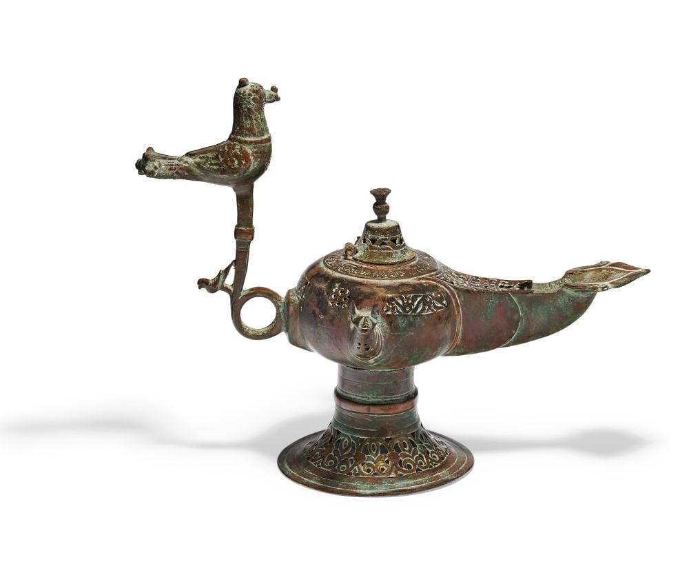 A KHORASSAN BRONZE OIL LAMP NORTH EAST IRAN, 12TH CENTURY OR LATER (1 of 8)