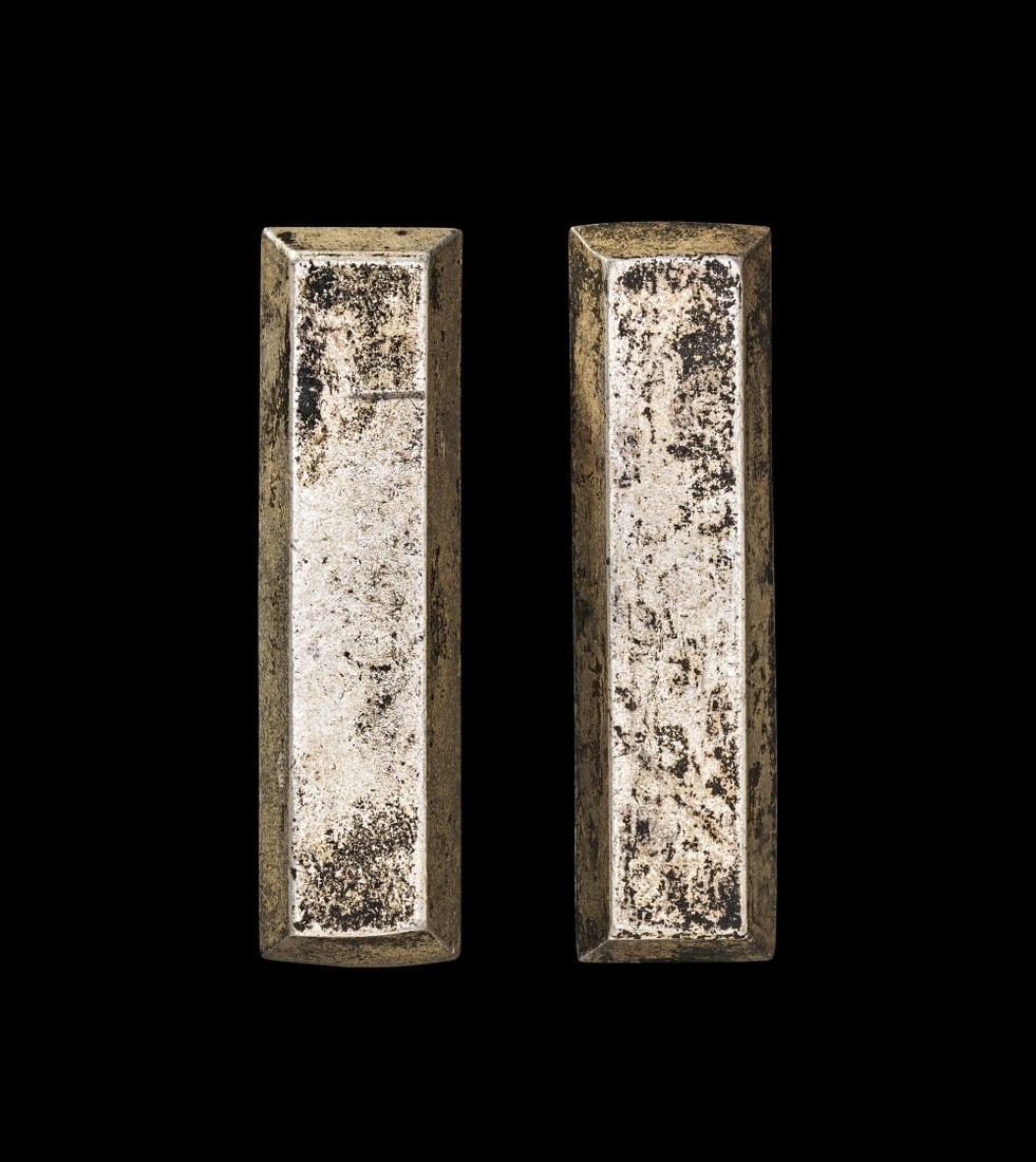 A PAIR OF WHITE METAL INSCRIBED CHINESE BARS, QING DYNASTY (1644-1911) (1 of 4)