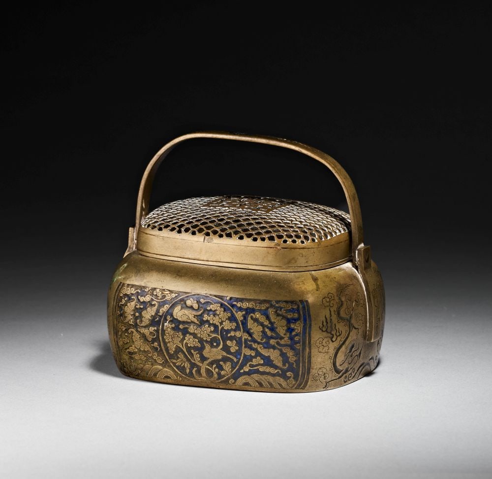 A CHINESE ENGRAVED & GILT ENAMEL COPPER HAND WARMER, QING DYNASTY (1644-1911) (1 of 9)