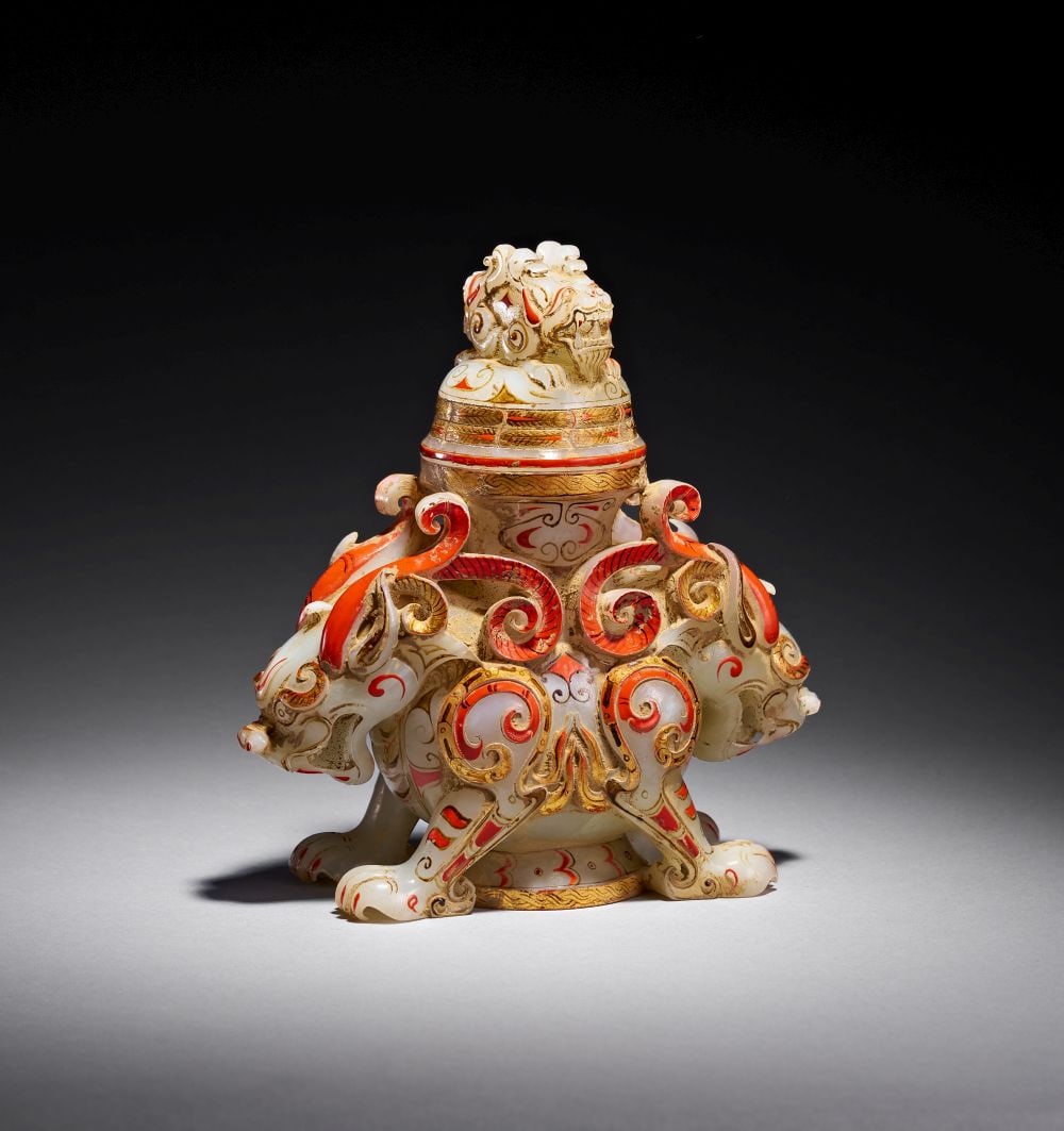 A GILT DECORATED CHINESE HETIAN JADE CARVING OF A MYTHICAL BEAST, QING DYNASTY (1644-1911) (1 of 6)