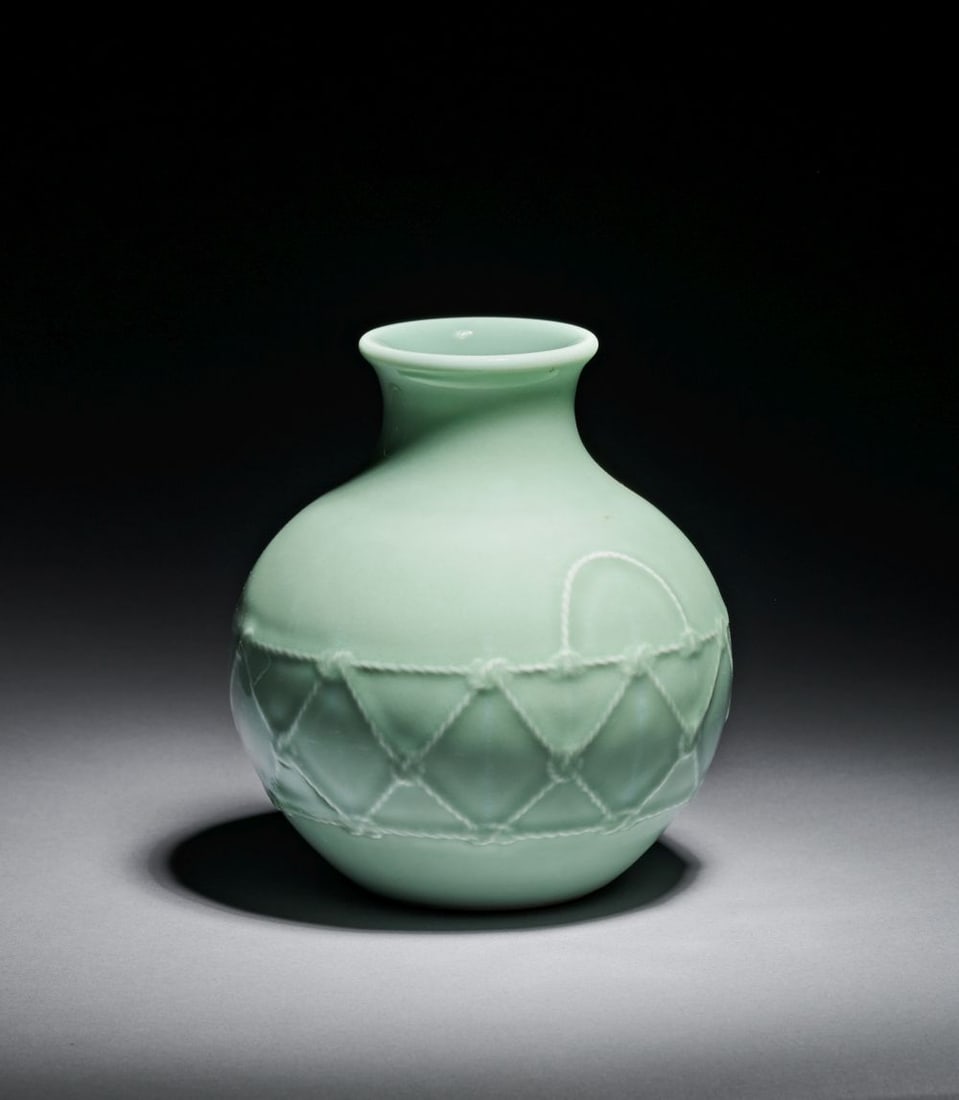 A CELADON-GLAZED MOULDED 'ROPE TWIST' GLOBULAR VASE, QING DYNASTY (1644-1911) (1 of 6)
