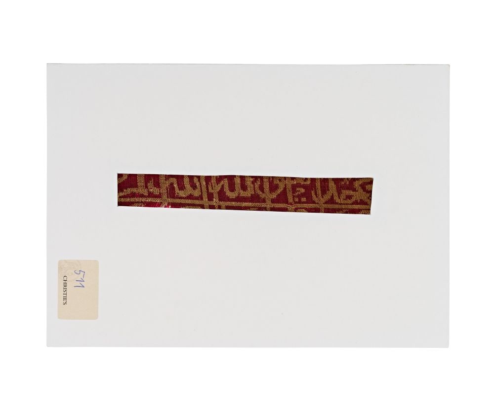 A FATIMID TIRAZ FRAGMENT EGYPT, 10TH/11TH CENTURY: A FATIMID TIRAZ FRAGMENT EGYPT, 10TH/11TH CENTURY This finely woven Fatimid tiraz fragment, produced in Egypt during the 10th or 11th century, preserves part of a narrow inscriptional band executed