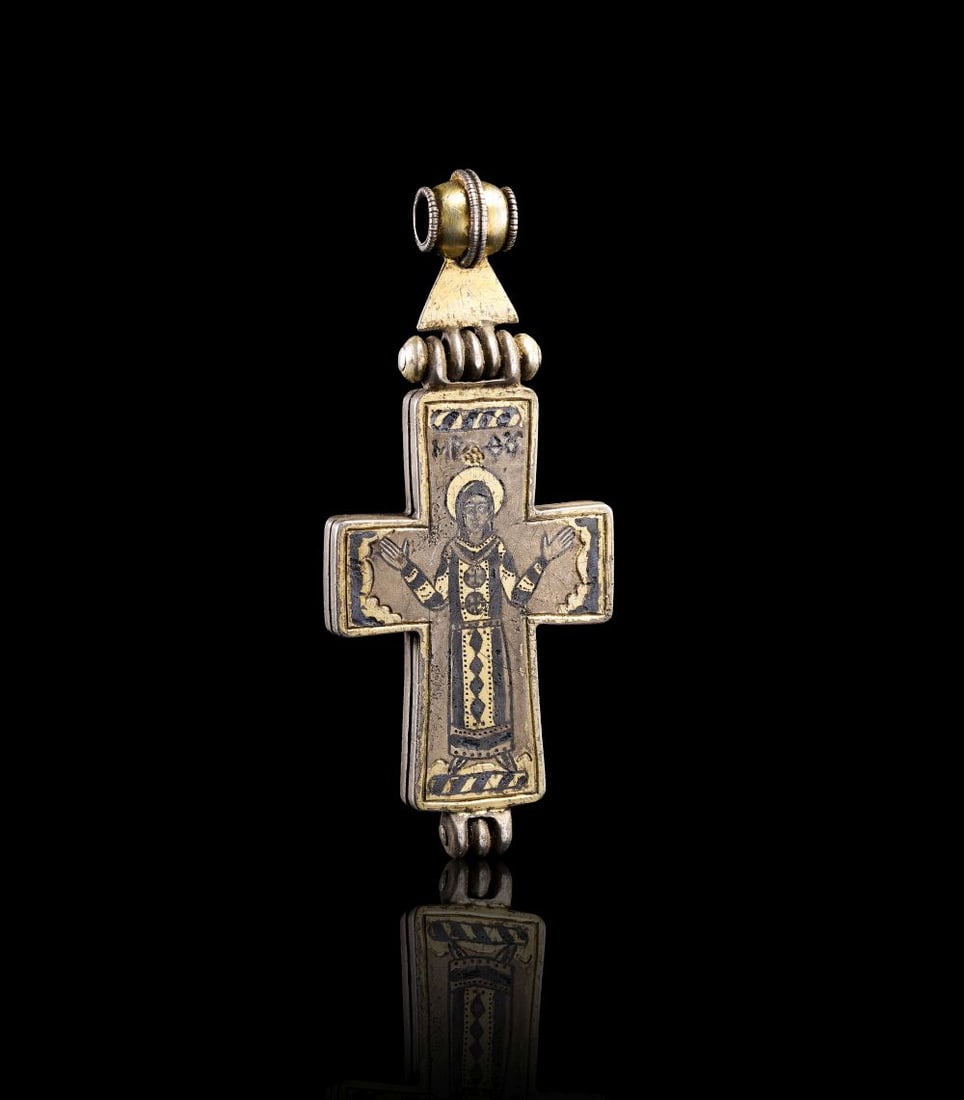 A LARGE BYZANTINE SILVER-GILT ENKOLPION CROSS WITH NIELLO, DEPICTING CHRIST & THE VIRGIN MARY, CIRCA: A LARGE BYZANTINE SILVER-GILT ENKOLPION CROSS WITH NIELLO, DEPICTING CHRIST & THE VIRGIN MARY, CIRCA 11TH-13TH CENTURY, EASTERN MEDITERRANEAN (ΜΡ ΘΥ) A powerful and imposing B