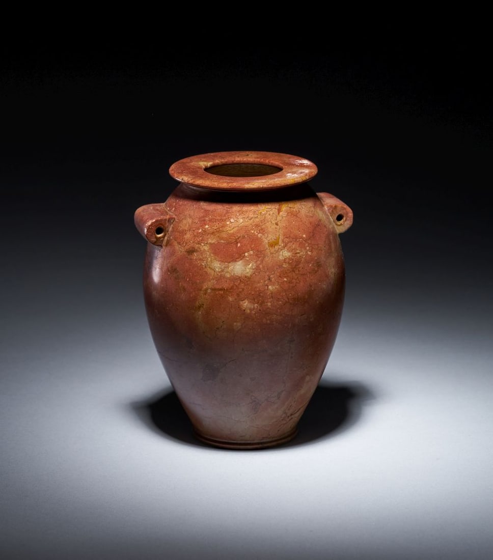 AN EGYPTIAN GRANODIORITE JAR PREDYNASTIC PERIOD, NAQADA III, CIRCA 3200-3000 B.C. (1 of 4)
