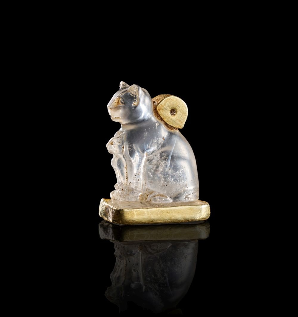 AN EGYPTIAN ROCK CRYSTAL BASTET AMULET WITH A KITTEN LATE PERIOD - PTOLEMAIC PERIOD CIRCA 664-30B.C. (1 of 3)