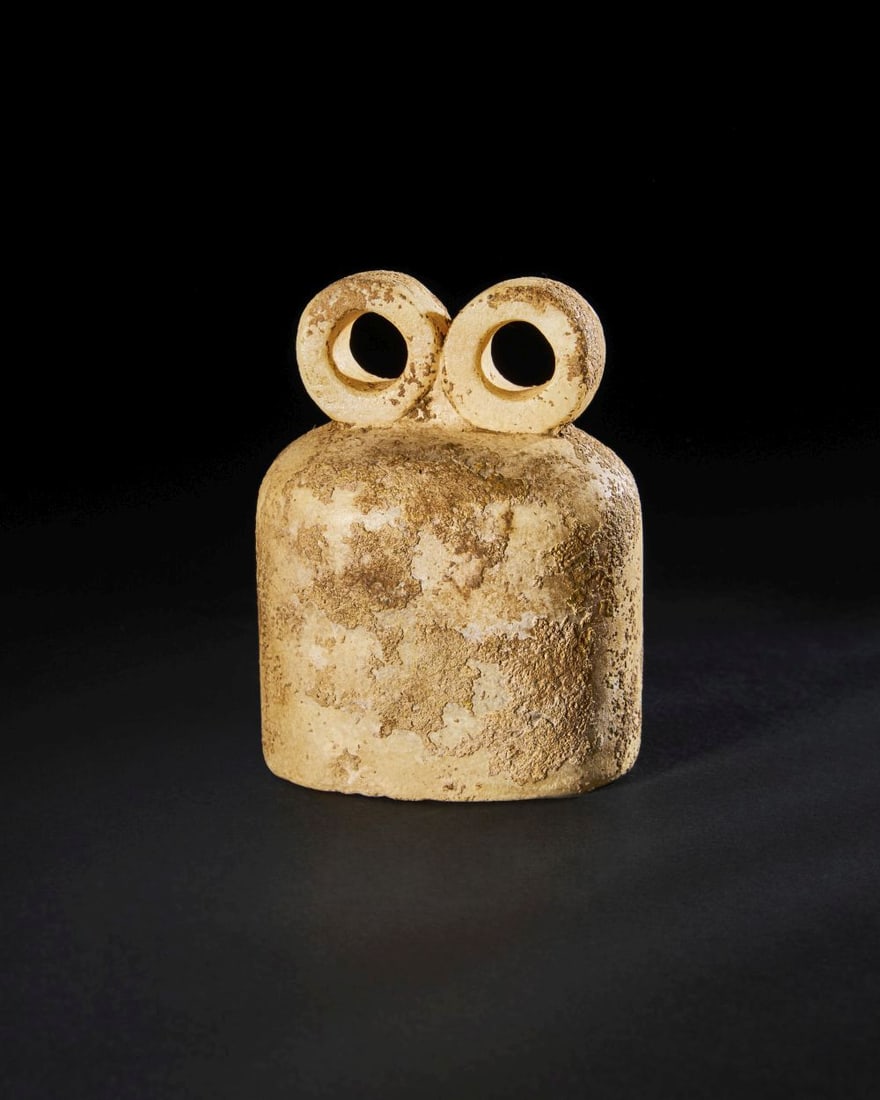A STONE DOUBLE “EYE?? IDOL Tell Brak Region, Circa 3500–3300 B.C. (1 of 1)