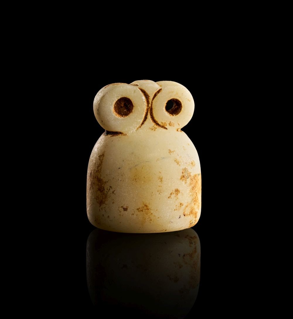 A MESOPOTAMIAN MARBLE EYE IDOL, CIRCA 3000 B.C. (1 of 3)