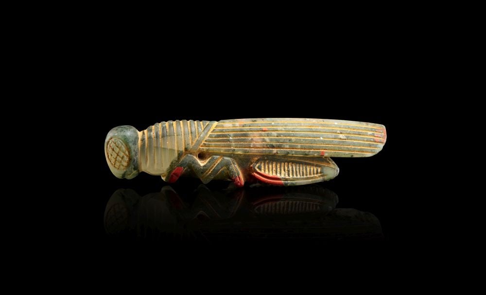 A NEAR EASTERN BLOODSTONE (HELIOTROPE) AMULET, 1ST MILLENNIUM B.C. (1 of 5)