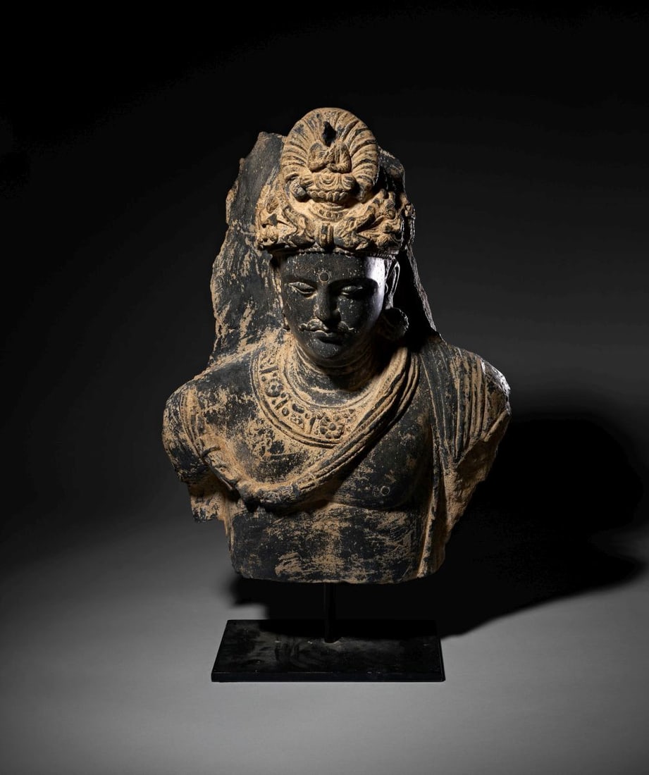 A GANDHARAN SCHIST FIGURE OF A BODHISATTVA, CIRCA 3RD–4TH CENTURY A.D.: A GANDHARAN SCHIST FIGURE OF A BODHISATTVA, CIRCA 3RD–4TH CENTURY A.D. Carved in dark grey sch