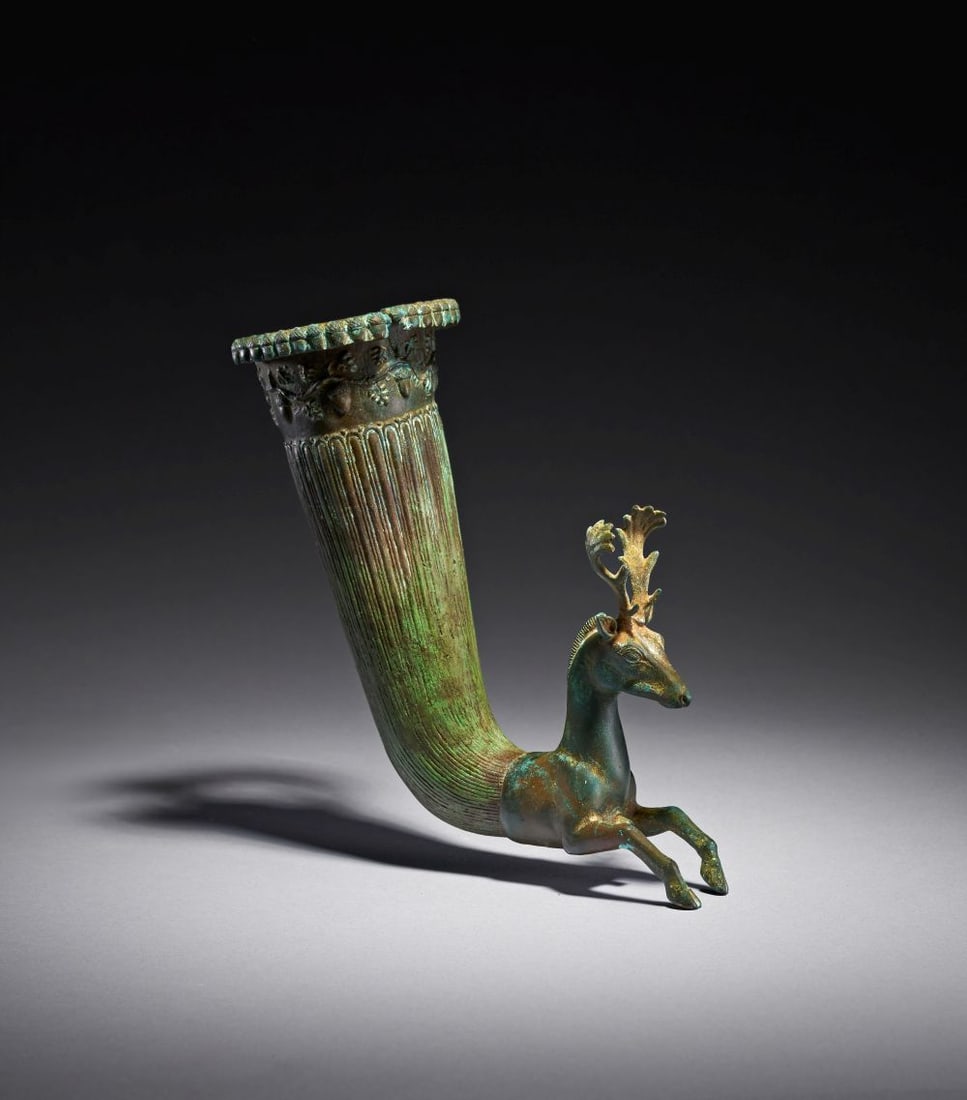 A CASPIAN BRONZE STAG HEAD RHYTON BRONZE AGE, CIRCA LATE 2ND MILLENNIUM B.C. (1 of 8)