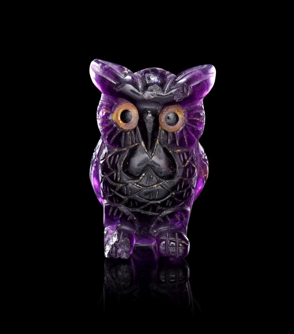 A GREEK/EASTERN MEDITERRANEAN AMETHYST OWL, CIRCA 4TH-3RD CENTURY B.C.: A GREEK/EASTERN MEDITERRANEAN AMETHYST OWL, CIRCA 4TH-3RD CENTURY B.C. A Greek/Eastern Mediterranean amethyst owl, circa 4th-3rd Century B.C. Carved from deep purple amethyst, the bird shown standing 
