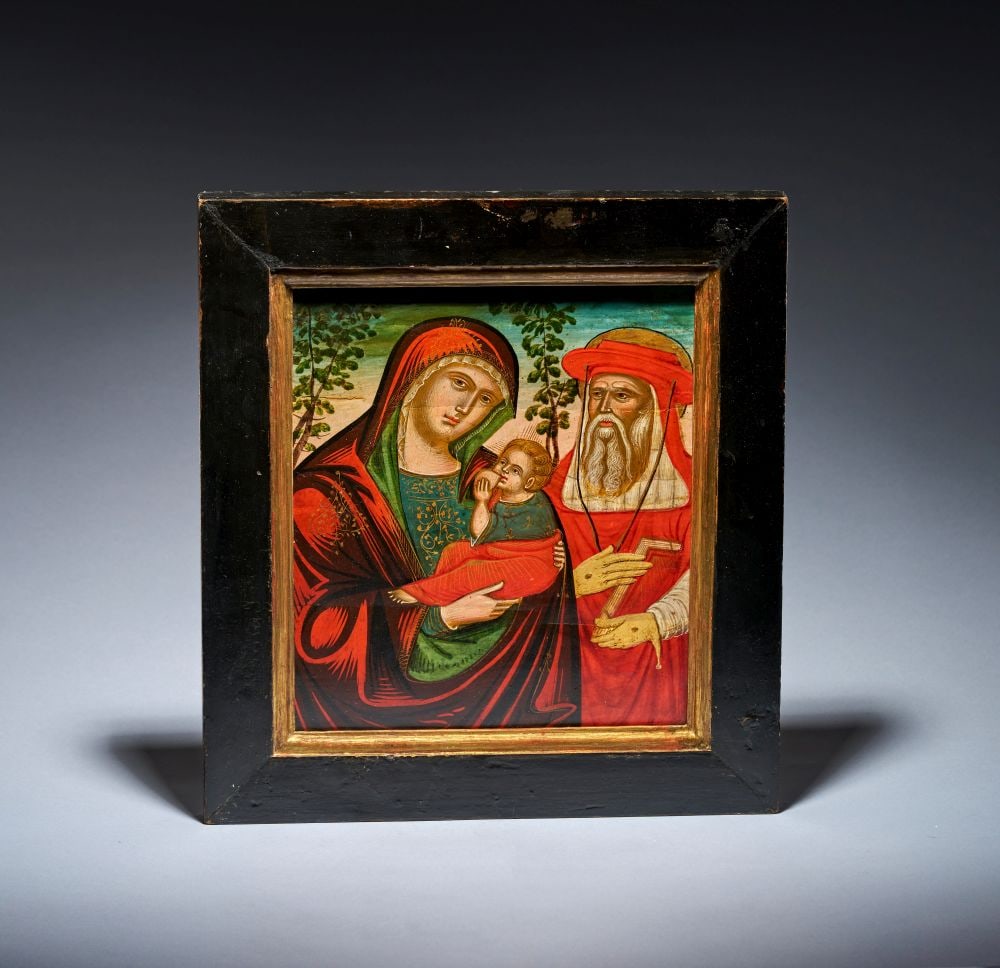 A VENETIAN CRETAN ICON, DEPICTING MARY & JESUS CHRIST IN THE GALAKTOTROPHOUSA POSE ACCOMPANIED BY SA: A VENETIAN CRETAN ICON, DEPICTING MARY & JESUS CHRIST IN THE GALAKTOTROPHOUSA POSE ACCOMPANIED BY SA Painted on panel and set within a later wooden frame, this devotional icon depicts the Virgin M