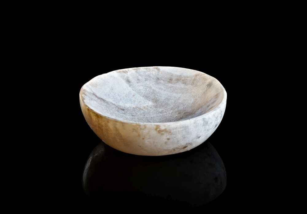 A ROMAN BANDED AGATE COSMETIC DISH, CIRCA 1ST-2ND CENTURY A.D.: A ROMAN BANDED AGATE COSMETIC DISH, CIRCA 1ST-2ND CENTURY A.D. A Roman banded agate cosmetic dish, circa 1st-2nd century A.D., carved as a small shallow bowl with rounded walls and a gently recessed i