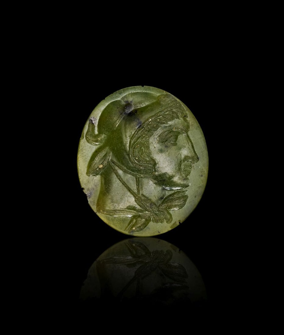 A ROMAN GREEN AGATE DEPICTING ALEXANDER THE GREAT IN PROFILE, CIRCA 1ST CENTURY B.C. - 1ST CENTURY A: A ROMAN GREEN AGATE DEPICTING ALEXANDER THE GREAT IN PROFILE, CIRCA 1ST CENTURY B.C. - 1ST CENTURY AD A Roman green agate intaglio, circa 1st century B.C.–1st century A.D., carved with a finely 