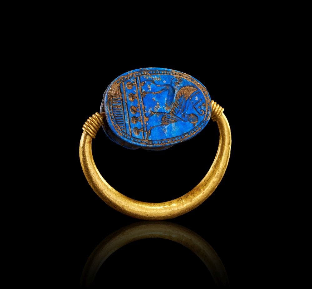 A GRECO-PERSIAN LAPIS LAZULI SCARABOID WITH A GRIFFIN ON A GOLD SWIVEL RING CIRCA LATE 5TH-EARLY 4TH (1 of 3)