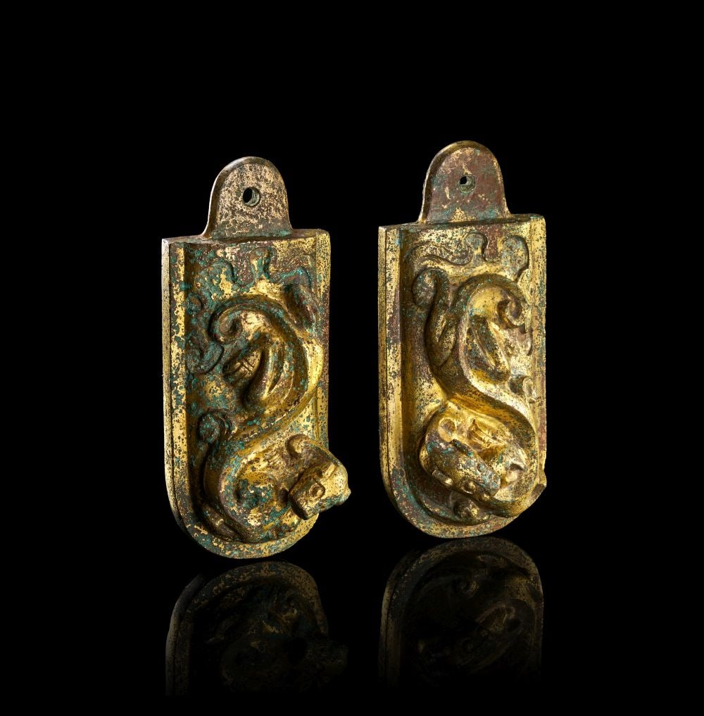 TWO CHINESE GILT-BRONZE BELT FITTINGS, CHINA, HAN DYNASTY (206 BC - AD 220) (1 of 5)