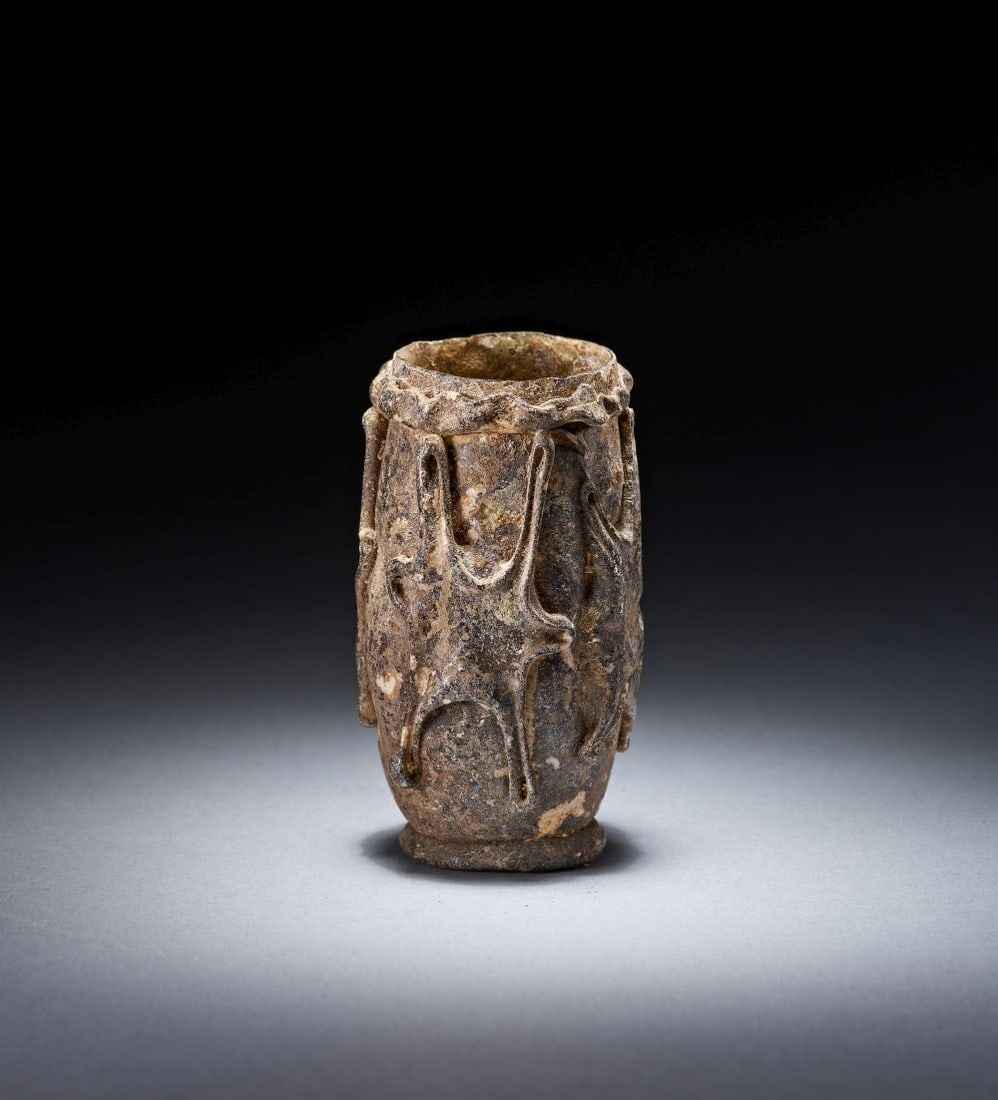 AN UMAYYAD OR EARLY ABBASID GLASS BEAKER WEST MEDITERRANEAN, 8TH/9TH CENTURY (1 of 4)
