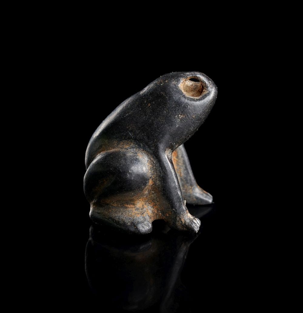AN EGYPTIAN BLACK STONE LEAPING FROG AMULET, 3RD MILLENNIUM B.C. (1 of 5)