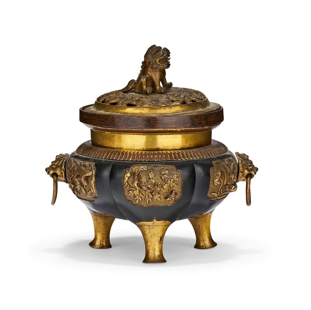 A PARCEL-GILT BRONZE 'MYTHICAL BEAST' TRIPOD CENSER AND COVER, QING DYNASTY (1644-1911) (1 of 7)