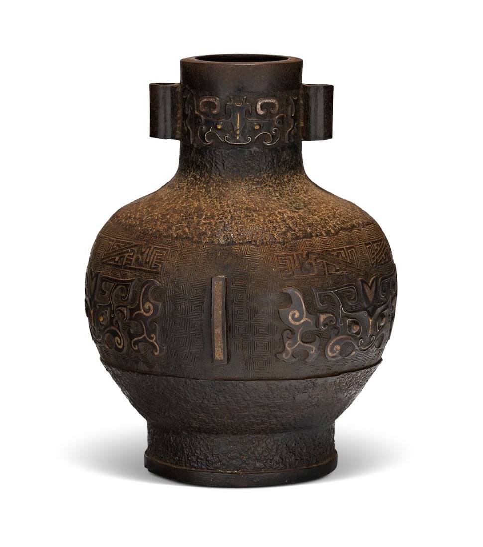 AN ARCHAISTIC PARCEL-GILT AND SILVERED-BRONZE VASE, HU, QING DYNASTY (1644-1911) (1 of 4)