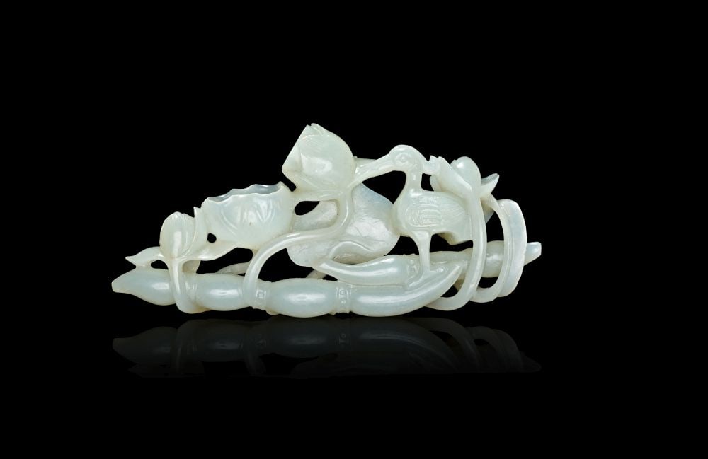 A CHINESE WHITE JADE CRANE AND PEACH GROUP, QING DYNASTY 19TH CENTURY (1 of 2)