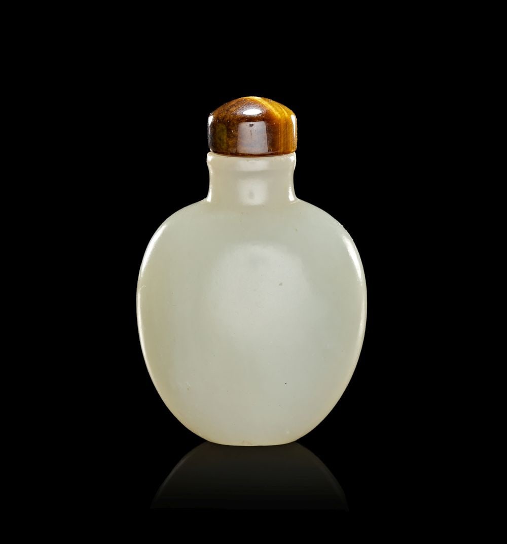 A WHITE JADE ROUNDED SQUARE SNUFF BOTTLE WITH TIGER EYE STOPPER,1720-1850 (1 of 2)