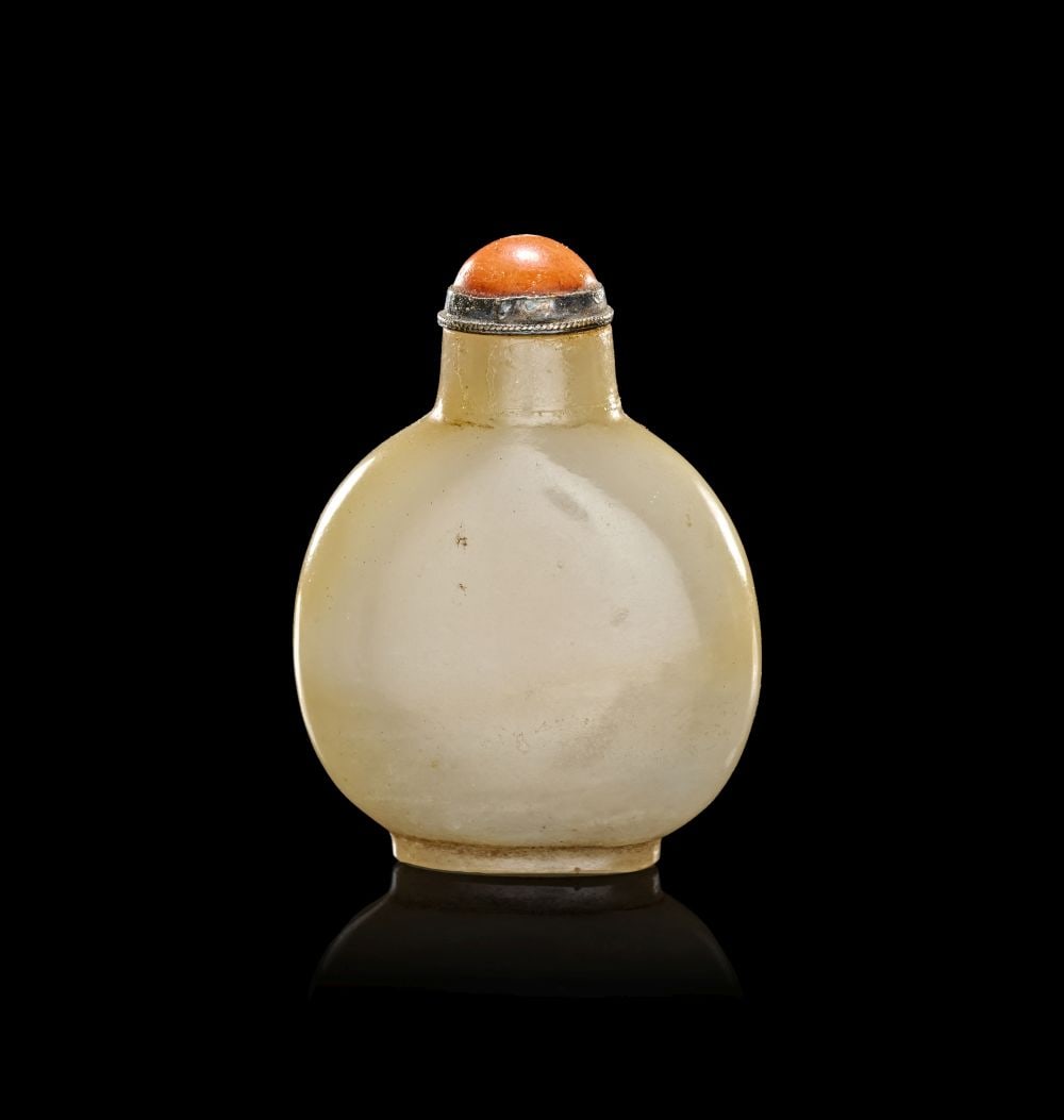 A CHINESE PALE GREEN JADE SNUFF BOTTLE, QING DYNASTY (1644-1911) (1 of 2)