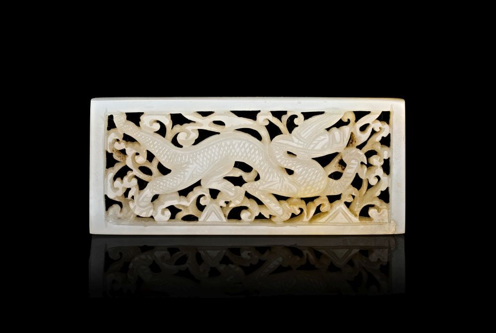 A CHINESE WHITE JADE RETICULATED DRAGON PLAQUE, 18TH/19TH CENTURY (1 of 1)