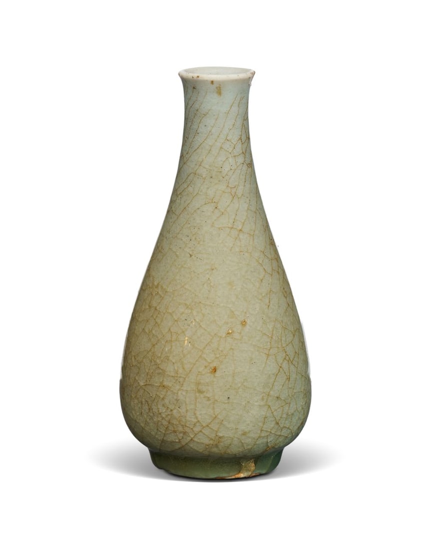 A SMALL GEYAO PEAR-SHAPED VASE YUAN/MING DYNASTY, 14TH-16TH CENTURY: A SMALL GEYAO PEAR-SHAPED VASE YUAN/MING DYNASTY, 14TH-16TH CENTURY The vase is elegantly potted in pear-shaped form, rising from a short foot to a swelling lower body, tapering through a slender neck