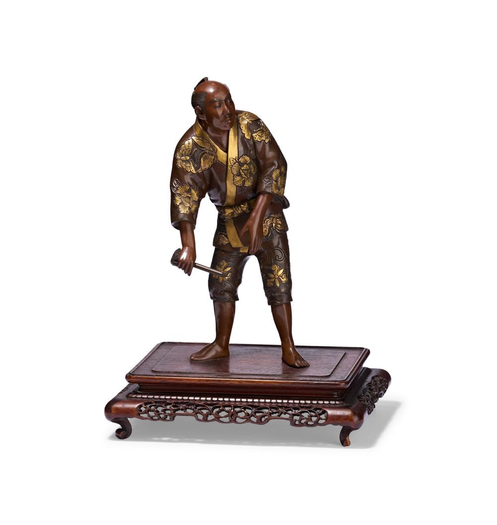 ATTRIBUTED TO MIYAO EISUKE: A GILT-DECORATED BRONZE FIGURE OF A MAN, 19TH CENTURY (1 of 8)