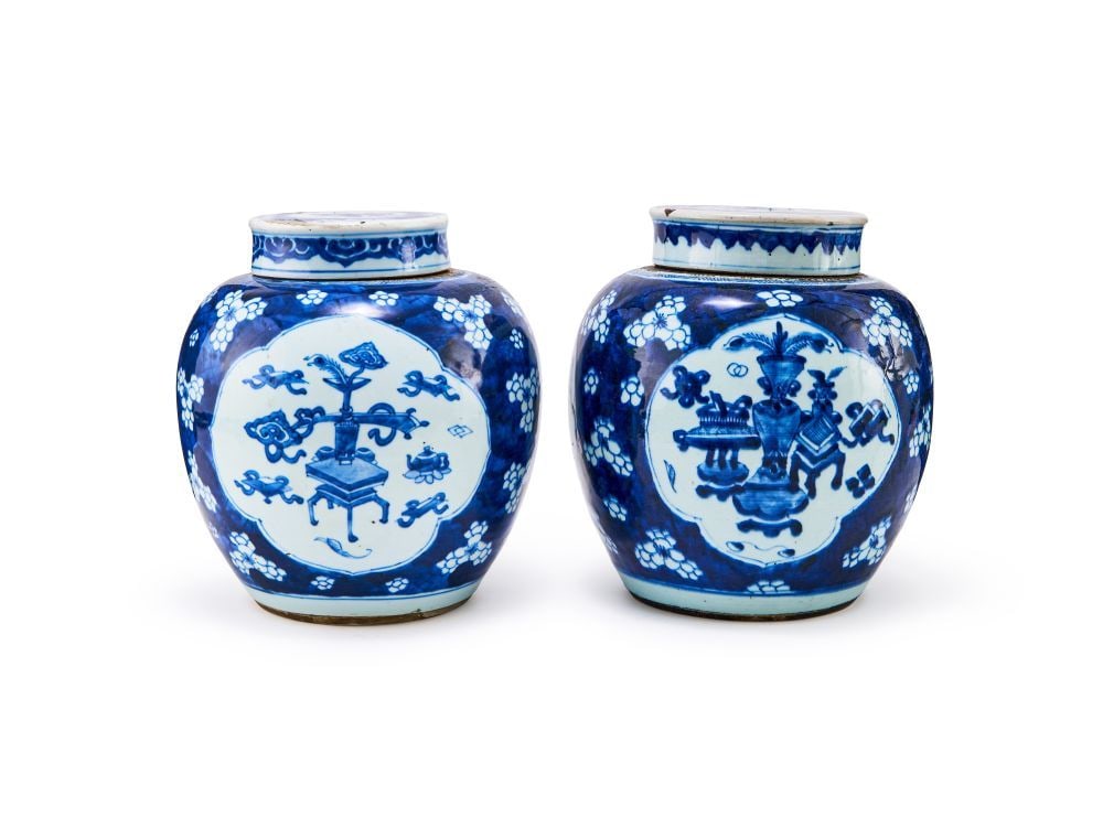 A PAIR OF CHINESE BLUE & WHITE JARS & COVERS, KANGXI PERIOD (1662-1722) (1 of 3)
