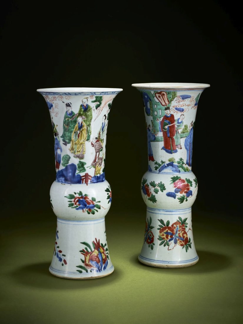 A PAIR OF CHINESE WUCAI FIGURAL GU BEAKER VASES Shunzhi Period, 1644–1661 (1 of 4)