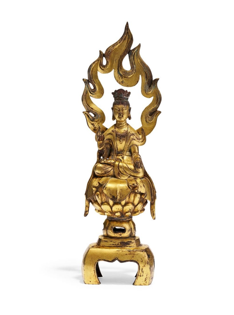 A CHINESE GILT-BRONZE FIGURE OF BUDDHA, MING DYNASTY (1368–1644) (1 of 4)