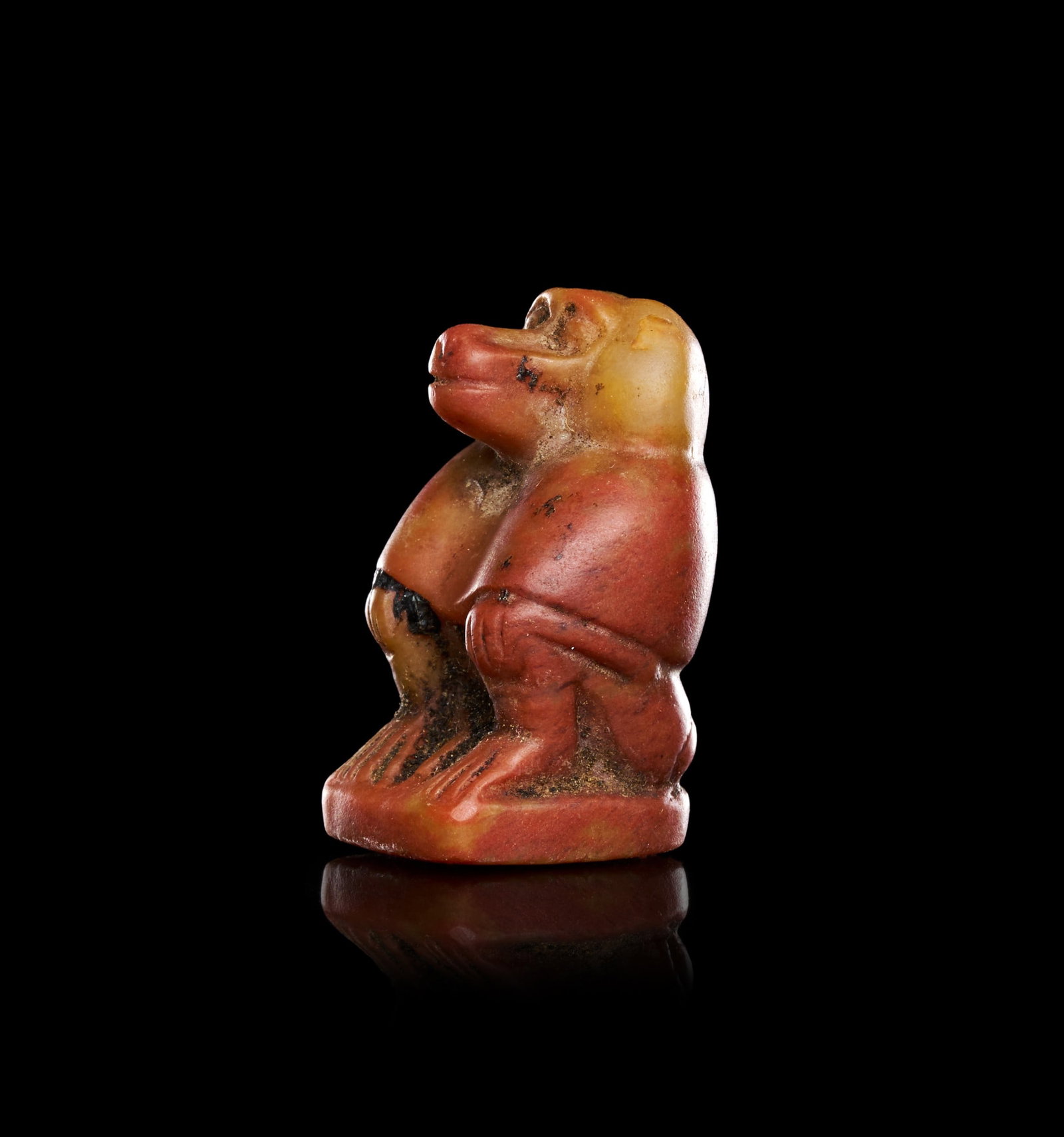 AN EGYPTIAN AGATE BABOON AMULET OF THOTH IN THE FORM OF SEATED BABOON, CIRCA 664-332 B.C. (1 of 1)