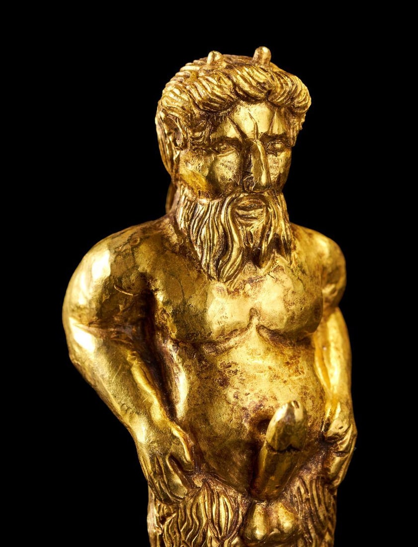 AN EXCEPTIONAL LATE ROMAN GOLD ITHYPHALLIC SATYR (SILENUS) PENDANT, CIRCA 2ND-4TH CENTURY A.D.: AN EXCEPTIONAL LATE ROMAN GOLD ITHYPHALLIC SATYR (SILENUS) PENDANT, CIRCA 2ND-4TH CENTURY A.D. Powerfully modeled in the round, this striking high-karat gold pendant depicts a bearded ithyphallic saty