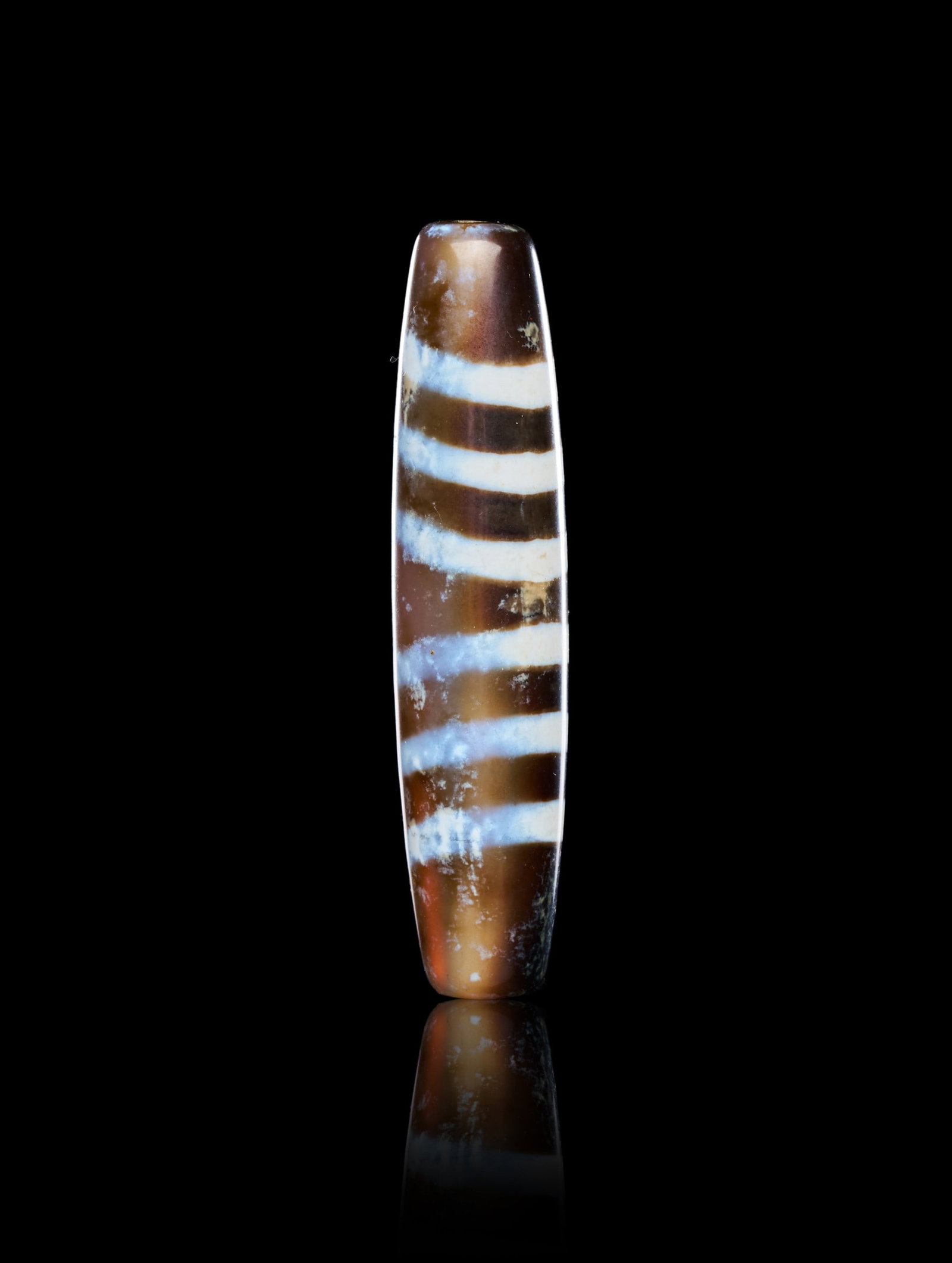 AN AGATE "DZI" EYE BEAD, CIRCA 1ST-2ND CENTURY A.D. - 2