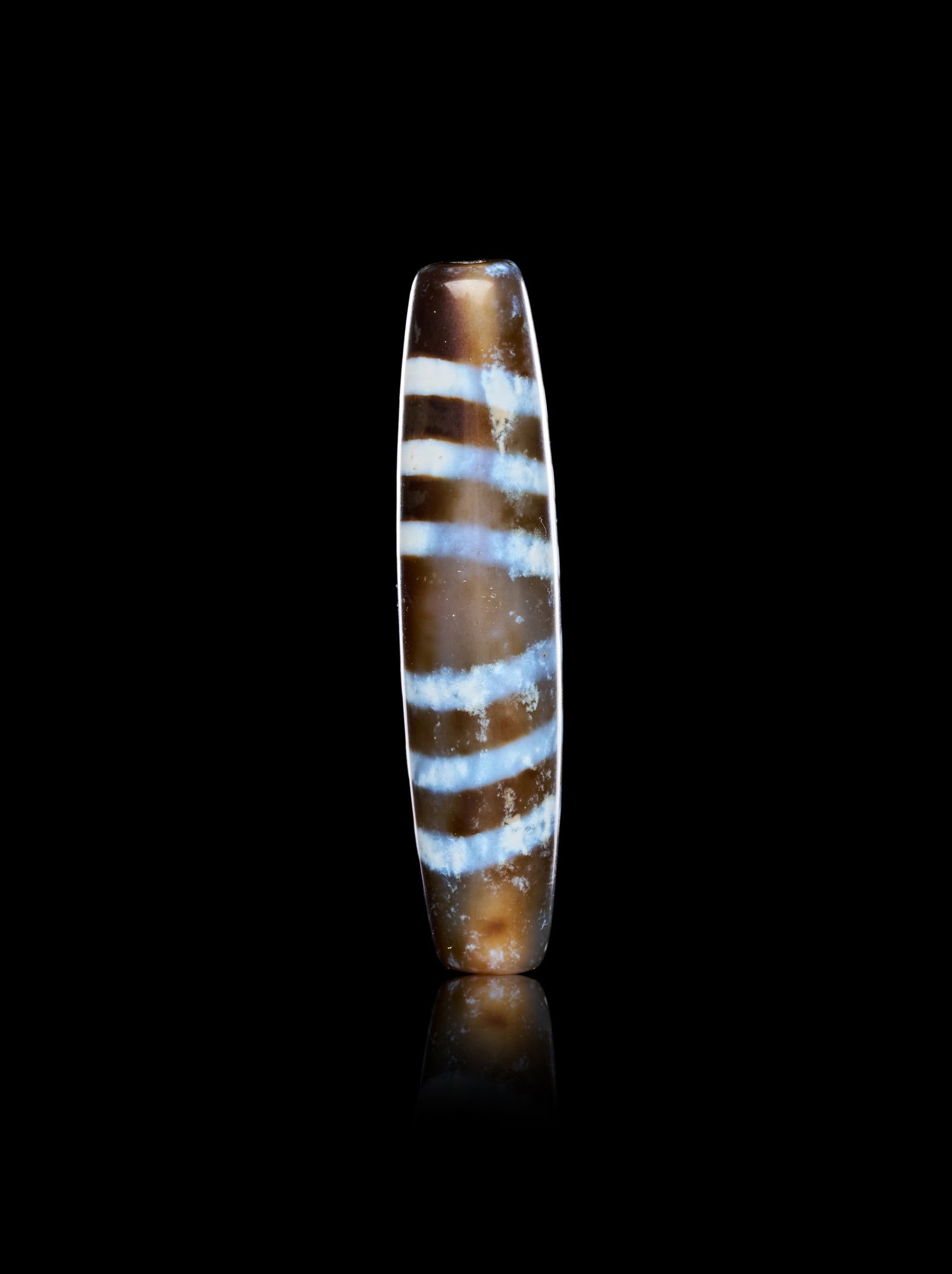 AN AGATE "DZI" EYE BEAD, CIRCA 1ST-2ND CENTURY A.D. - 3