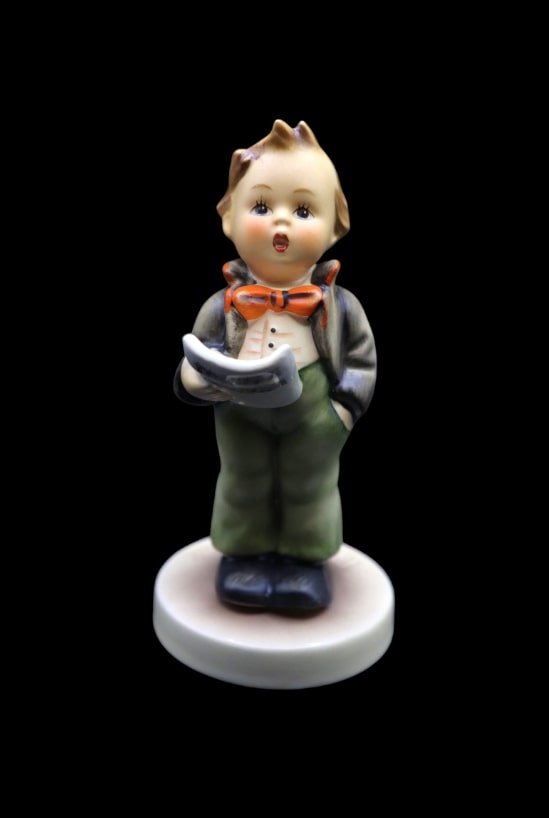 Goebel Hummel Porcelain “Soloist” #135 Figurine - TMK6: Cute Goebel Hummel figurine in the Soloist #135 pattern. It features a young musician in the act of singing. This piece is in good vintage condition with no noticeable damage or chips, no deep scratch