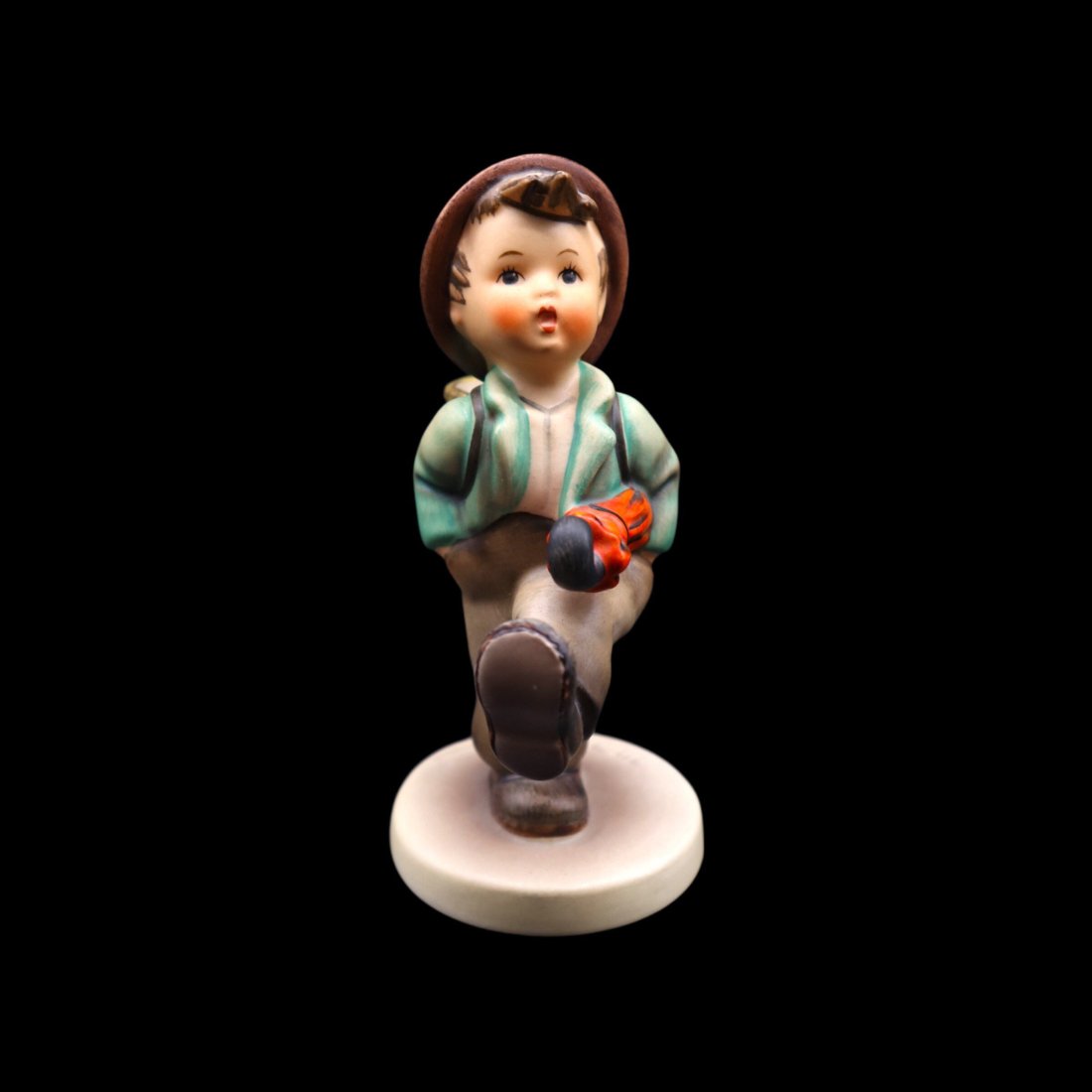 Goebel Hummel Porcelain “Globe Trotter” #79 Figurine - TMK5: Adorable Goebel Hummel porcelain figurine titled Globe Trotter in great vintage condition with no chips, scratches, crazing or cracks. This piece was released in 1978 and has since been retired. It fe