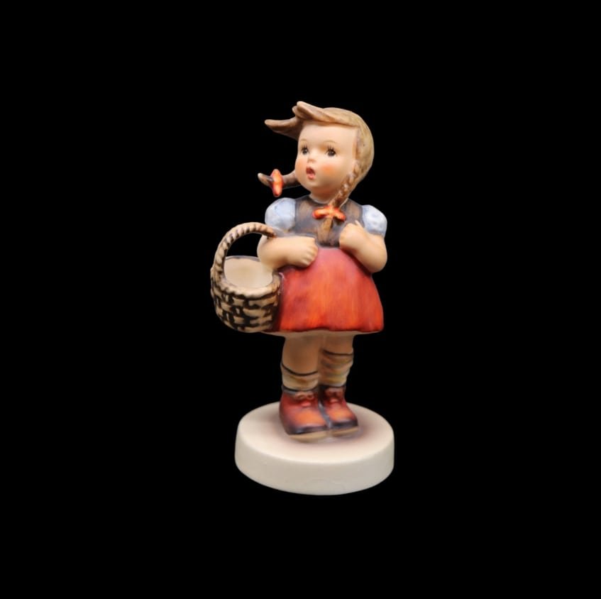 Goebel Hummel Porcelain “Little Shopper” #96 Figurine - TMK5: Adorable Goebel Hummel porcelain figurine titled Little Shopper in great vintage condition with no chips, scratches, cracks or crazing. This piece was released in 1935 and has since been retired. It f