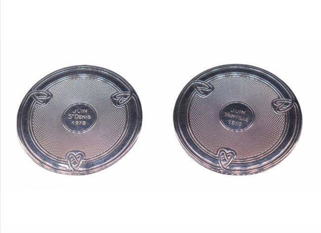 Christofle Celtic Knot Geometric Silverplate Drink Coasters - ENGRAVED: Classic Christofle drink coasters with a beautiful Celtic cross geometric pattern. They are Silverplate and are engraved in the center with cities in France and the year 1978. They are in great vintag