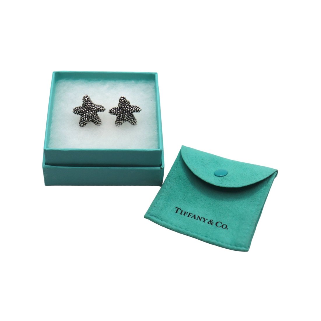 Tiffany & Co. Sterling Silver Bumpy Starfish Omega Back Pierced Earrings: Cute Tiffany & Co. sterling silver bumpy starfish earrings with omega back, for pierced ears in excellent vintage condition with no noticeable damage, no tarnishing, no dents or cracks. The earrings w